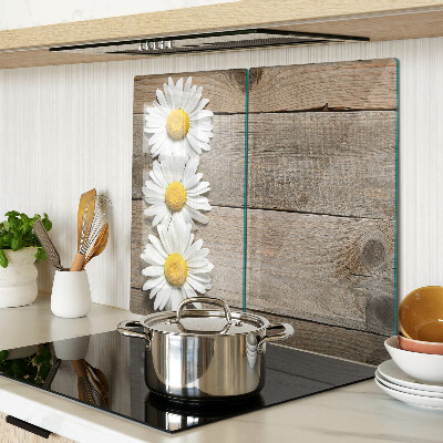 Glazen snijplanken Bloemen op een houten achtergrond
