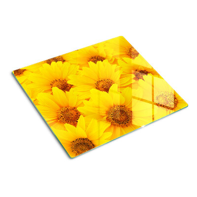 Glazen snijplanken Zonnebloemen op een gele achtergrond