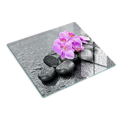 Glazen snijplanken Bloemen en stenen tegen het water