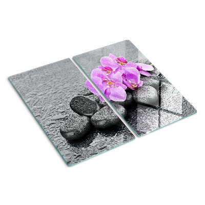 Glazen snijplanken Bloemen en stenen tegen het water