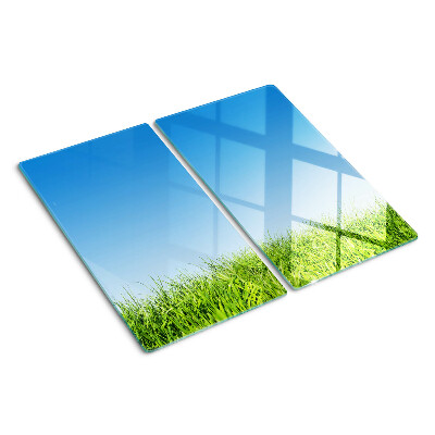 Snijplanken glas Groene weide onder blauwe lucht