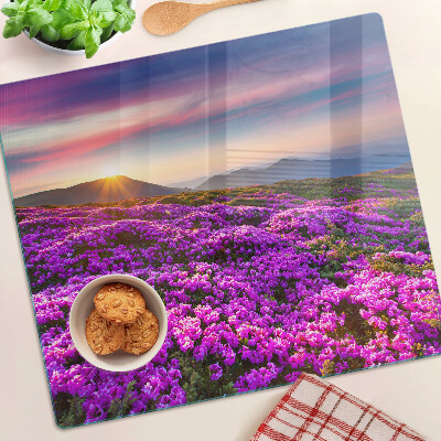 Glazen snijplanken Bloemenlandschap bij zonsondergang