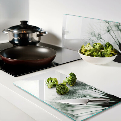 Snijplanken glas Paardenbloemen met waterdruppels