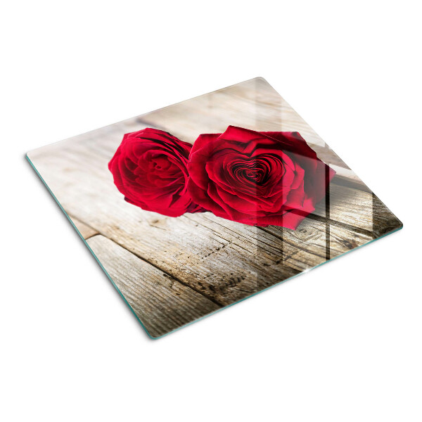 Snijplanken glas Rode rozen op een houten achtergrond