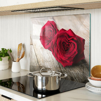 Snijplanken glas Rode rozen op een houten achtergrond