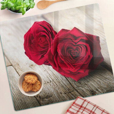 Snijplanken glas Rode rozen op een houten achtergrond