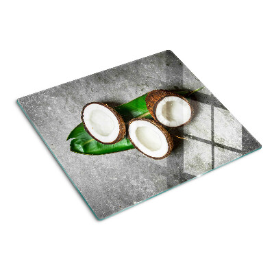 Snijplanken glas Kokosnoot op betonnen achtergrond