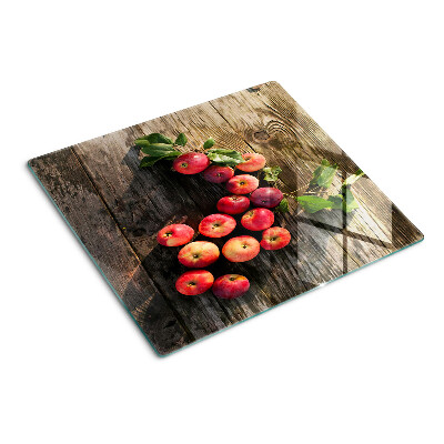 Glazen snijplanken Appels op een houten achtergrond