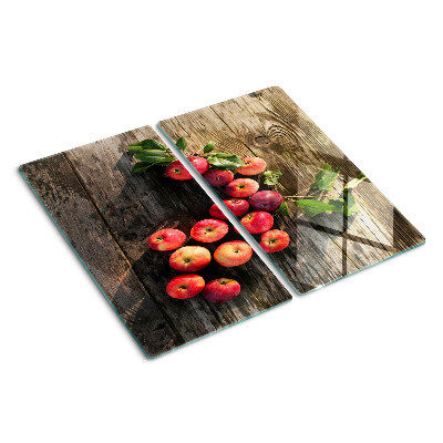 Glazen snijplanken Appels op een houten achtergrond