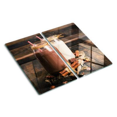 Snijplanken glas Potten met drankjes op een houten achtergrond