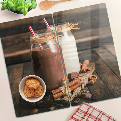 Snijplanken glas Potten met drankjes op een houten achtergrond