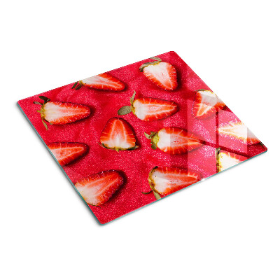 Glazen snijplanken Aardbeien op een roze achtergrond