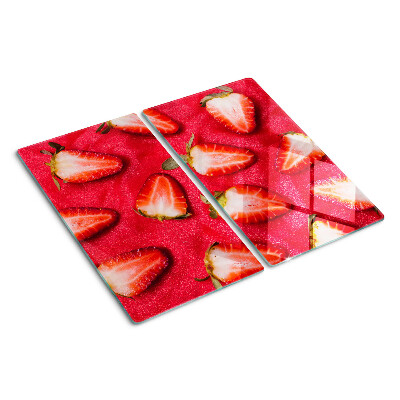 Glazen snijplanken Aardbeien op een roze achtergrond
