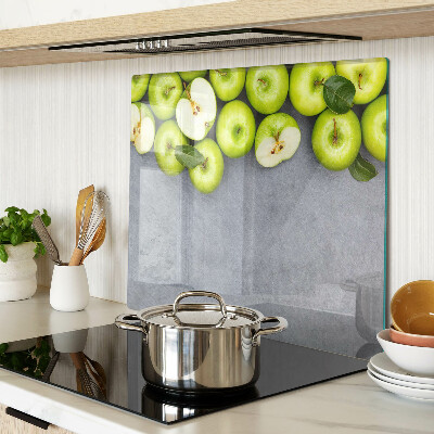 Glazen snijplanken Groene appels op een grijs oppervlak