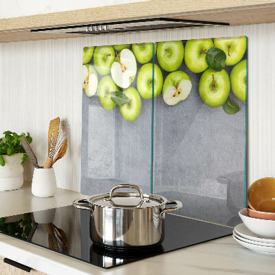 Glazen snijplanken Groene appels op een grijs oppervlak