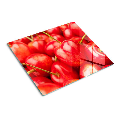 Snijplanken glas Kersen op een rode achtergrond