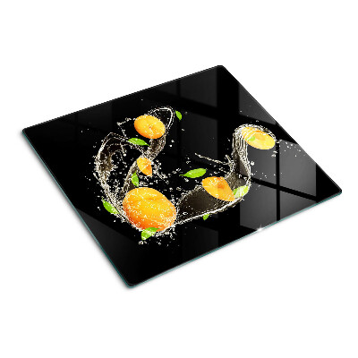 Snijplanken glas Citrusvruchten in water