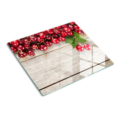 Snijplanken glas Kersen op een houten achtergrond