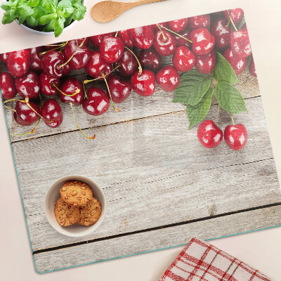 Snijplanken glas Kersen op een houten achtergrond