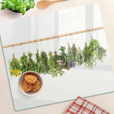 Snijplanken glas Gedroogde kruiden aan een touwtje