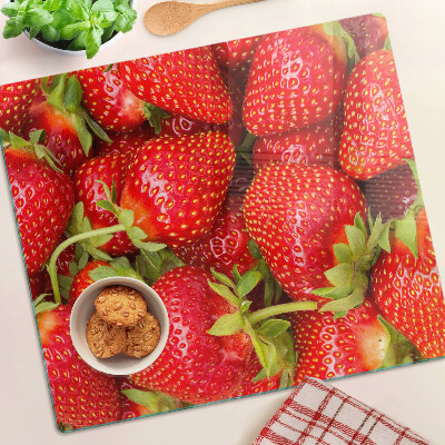 Snijplanken glas Aardbeien op de achtergrond