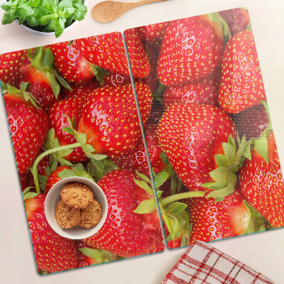 Snijplanken glas Aardbeien op de achtergrond