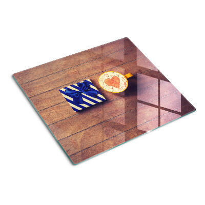 Glazen snijplanken Een cadeau met een hart op een kopje