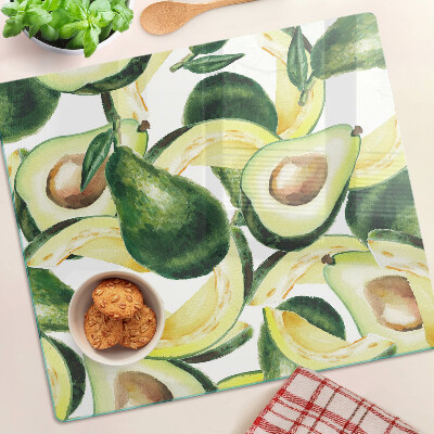 Snijplanken glas Avocado op een achtergrond van bladeren