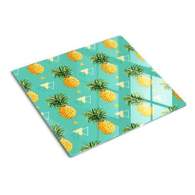 Glazen snijplanken Ananassen op een turquoise achtergrond