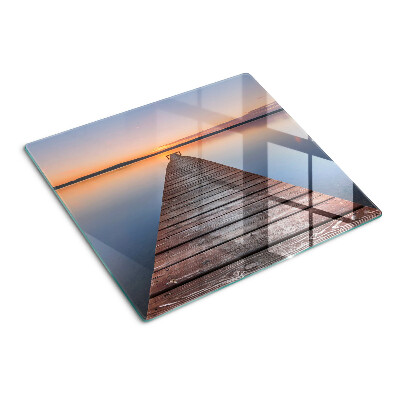 Glazen snijplanken Pier op het meer bij zonsondergang