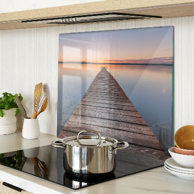 Glazen snijplanken Pier op het meer bij zonsondergang