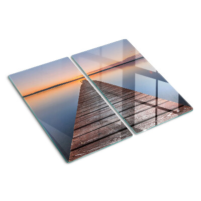 Glazen snijplanken Pier op het meer bij zonsondergang