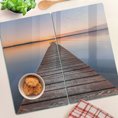 Glazen snijplanken Pier op het meer bij zonsondergang