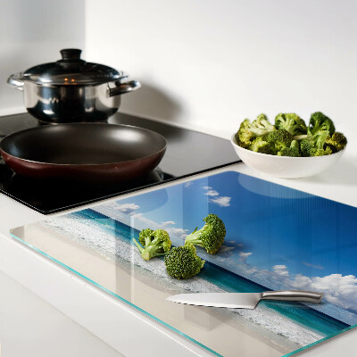 Snijplanken glas Strand met turquoise water en wolken