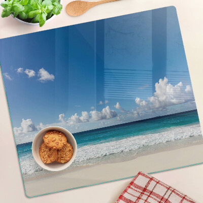 Snijplanken glas Strand met turquoise water en wolken