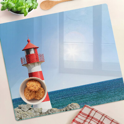 Snijplanken glas Vuurtoren boven de oceaan