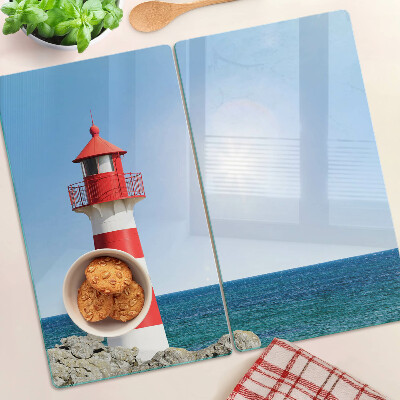 Snijplanken glas Vuurtoren boven de oceaan