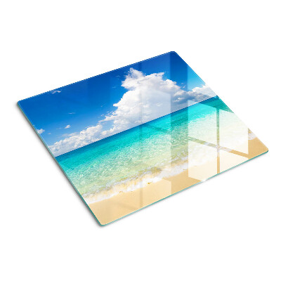 Glazen snijplanken Strand met turquoise water en wolken
