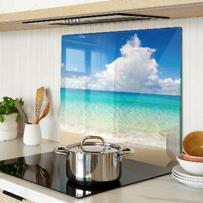 Glazen snijplanken Strand met turquoise water en wolken