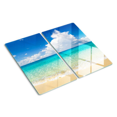 Glazen snijplanken Strand met turquoise water en wolken