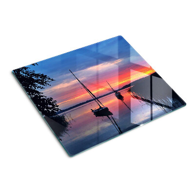 Snijplanken glas Zonsondergang over het meer