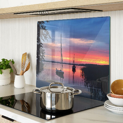 Snijplanken glas Zonsondergang over het meer