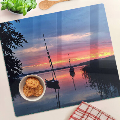Snijplanken glas Zonsondergang over het meer