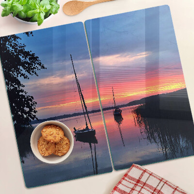 Snijplanken glas Zonsondergang over het meer