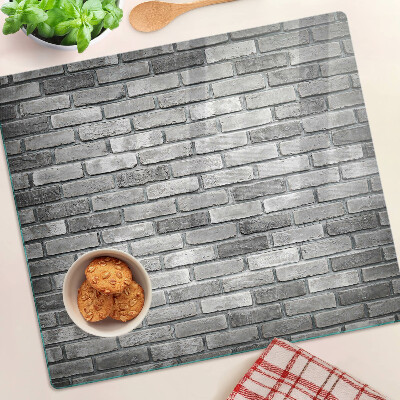 Snijplanken glas Bakstenen muur in grijstinten