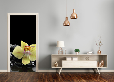 Deur sticker Orchidee en stenen