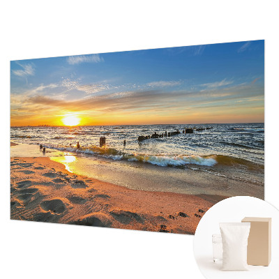 Fotobehang slaapkamer met een zonsondergang op het strand