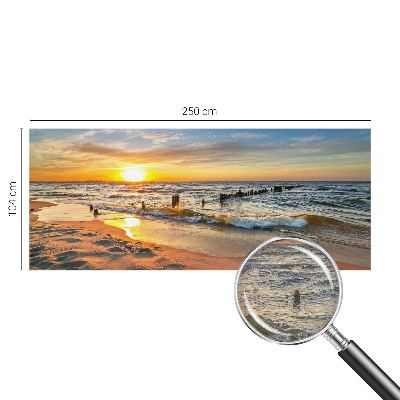 Fotobehang slaapkamer met een zonsondergang op het strand