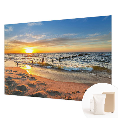 Fotobehang slaapkamer met een zonsondergang op het strand