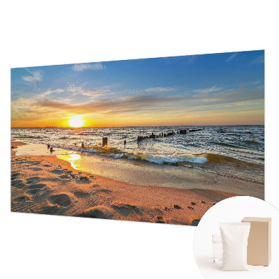 Fotobehang slaapkamer met een zonsondergang op het strand